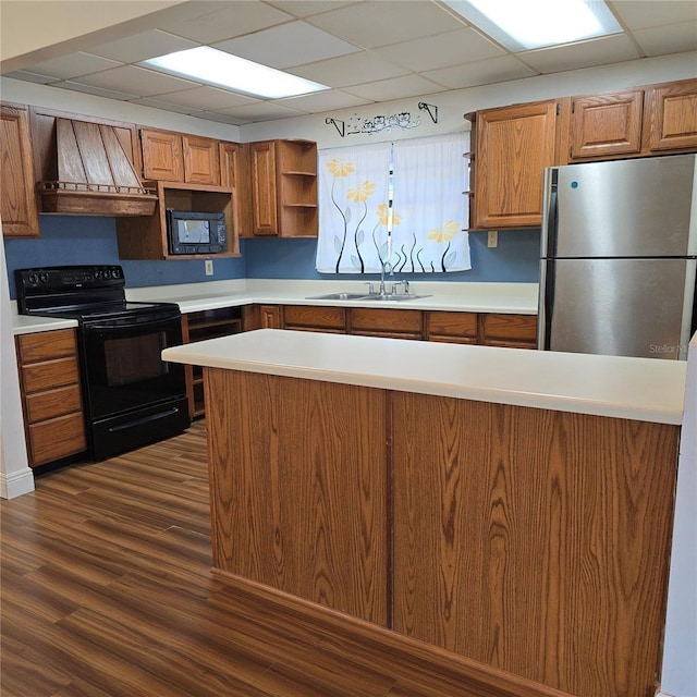 kitchen featuring open shelves, dark wood-type flooring, a sink, premium range hood, and black appliances