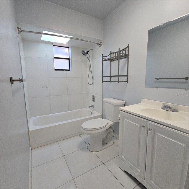 bathroom with toilet, tile patterned flooring, shower / washtub combination, and vanity