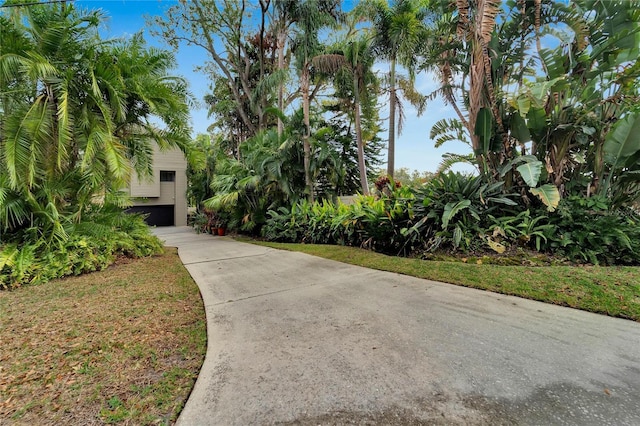 view of front of property featuring driveway and an attached garage