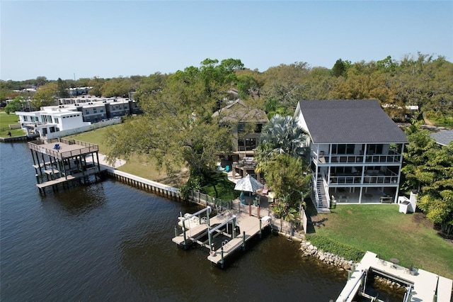 drone / aerial view with a water view