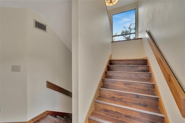 staircase with visible vents