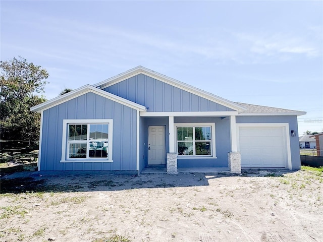 view of front of home featuring a garage and board and batten siding