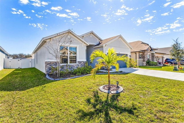 view of front of home with a garage, concrete driveway, stone siding, a gate, and a front lawn