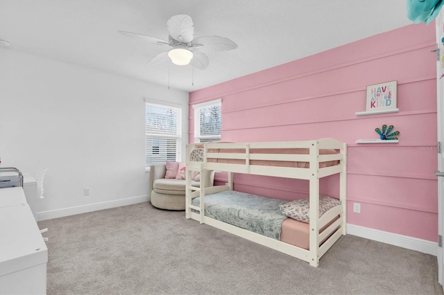 bedroom featuring ceiling fan, carpet floors, and baseboards