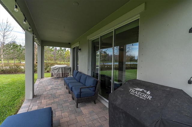 view of patio featuring an outdoor hangout area and grilling area