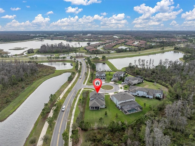 drone / aerial view with a water view