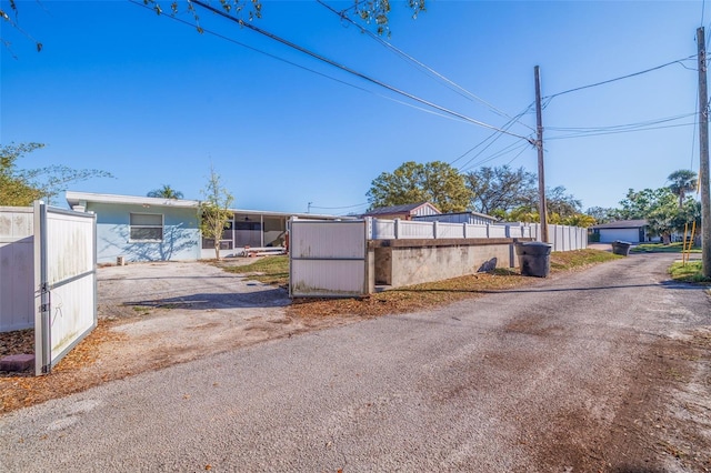 view of front of property featuring fence