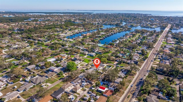 aerial view featuring a water view and a residential view