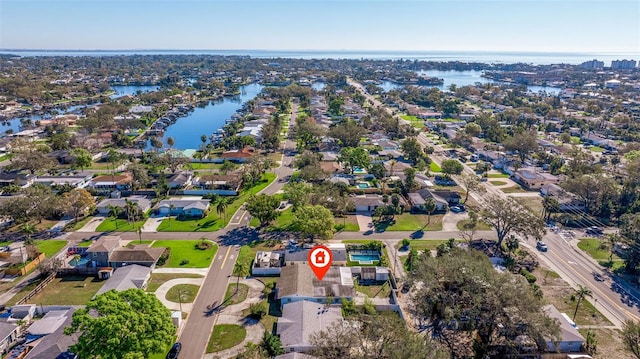 aerial view featuring a water view and a residential view