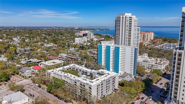 aerial view featuring a city view and a water view