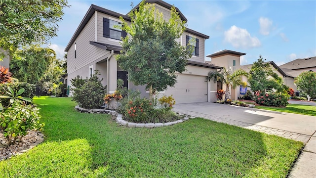 view of front facade featuring concrete driveway, an attached garage, a front yard, and stucco siding