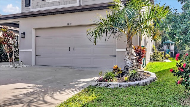 garage featuring driveway