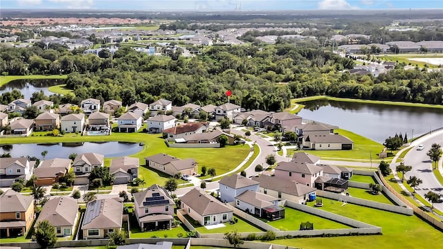 aerial view featuring a residential view and a water view