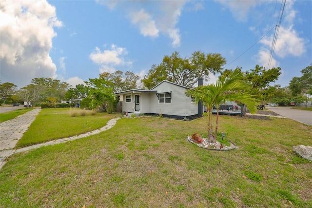 view of front of house with a front lawn