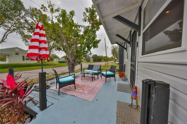 5601 2nd Ave N, Saint Petersburg, FL 33710 - view of patio featuring an outdoor living space