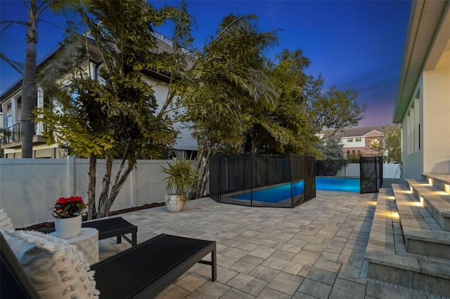 view of patio with a fenced backyard and a fenced in pool