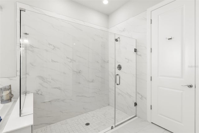 full bath with marble finish floor, a marble finish shower, and recessed lighting