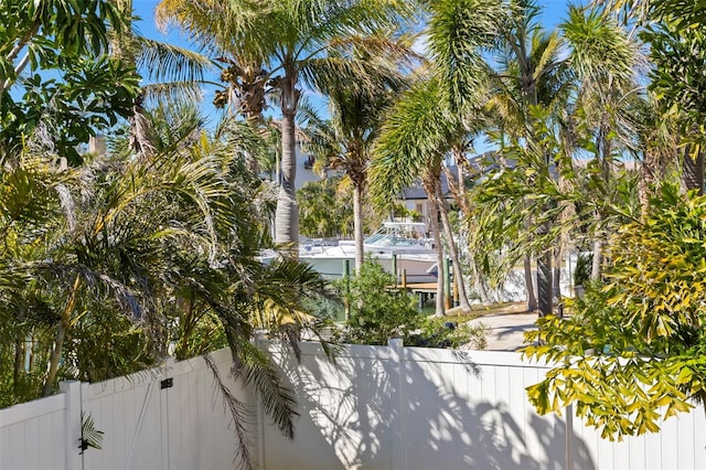 exterior space featuring fence private yard and a gate