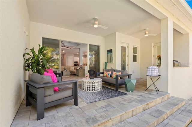 view of patio / terrace featuring a ceiling fan and outdoor lounge area