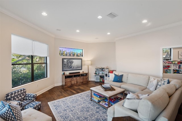 living area with baseboards, visible vents, ornamental molding, wood finished floors, and recessed lighting