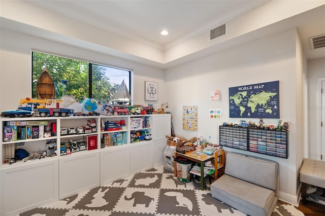 playroom with ornamental molding, visible vents, and recessed lighting