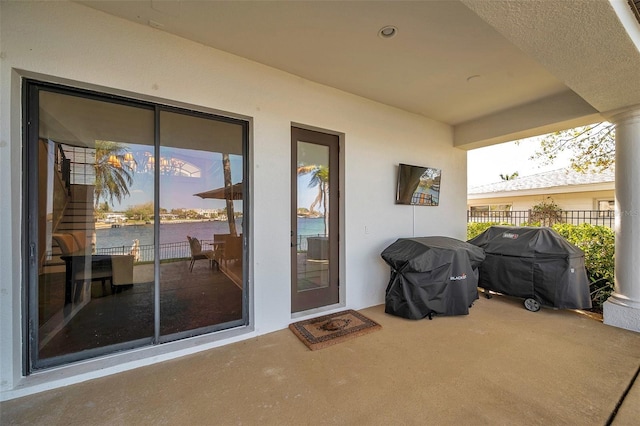 view of patio / terrace with fence and grilling area