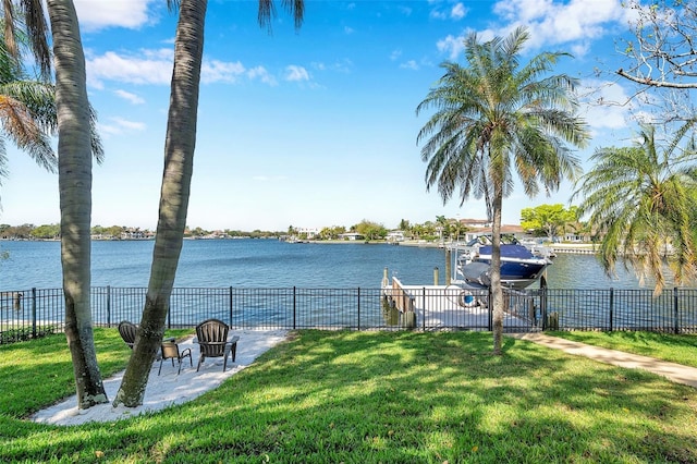 exterior space featuring a dock and fence