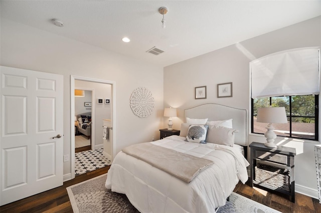 bedroom featuring recessed lighting, wood finished floors, visible vents, and baseboards