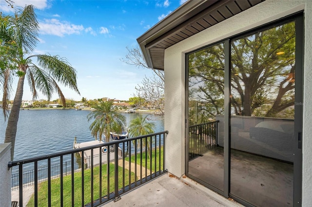 balcony featuring a water view