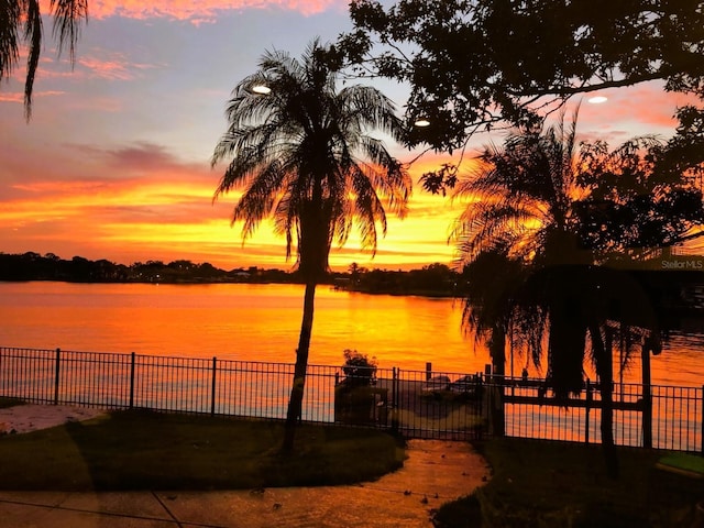 water view featuring fence