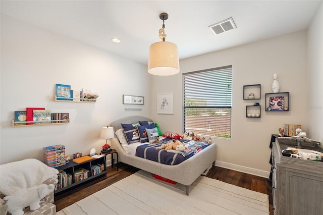 bedroom featuring dark wood-style flooring, recessed lighting, visible vents, and baseboards