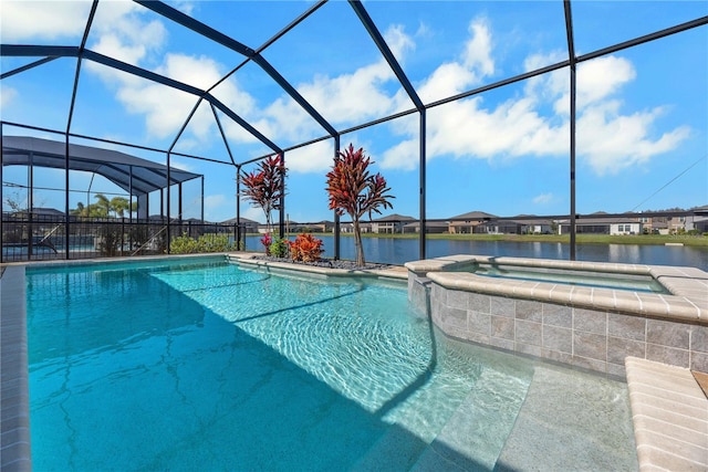 view of swimming pool featuring a water view, a lanai, and a pool with connected hot tub