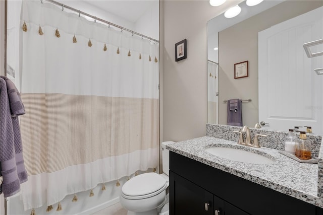 bathroom featuring vanity, toilet, and shower / tub combo with curtain