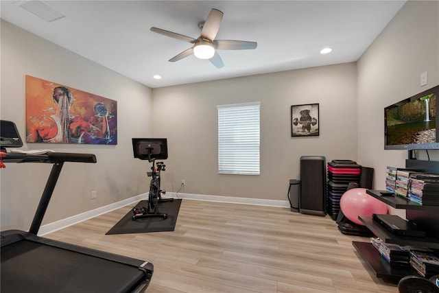 workout room featuring visible vents, recessed lighting, light wood-style flooring, and baseboards