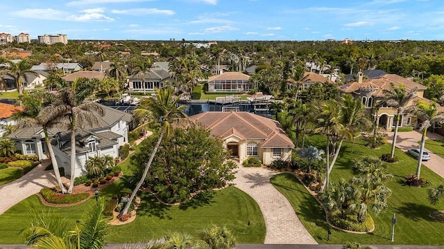 birds eye view of property with a residential view