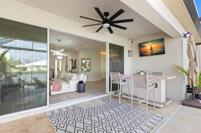 view of patio with ceiling fan