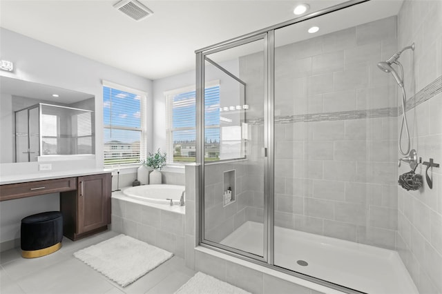 full bathroom with a shower stall and visible vents