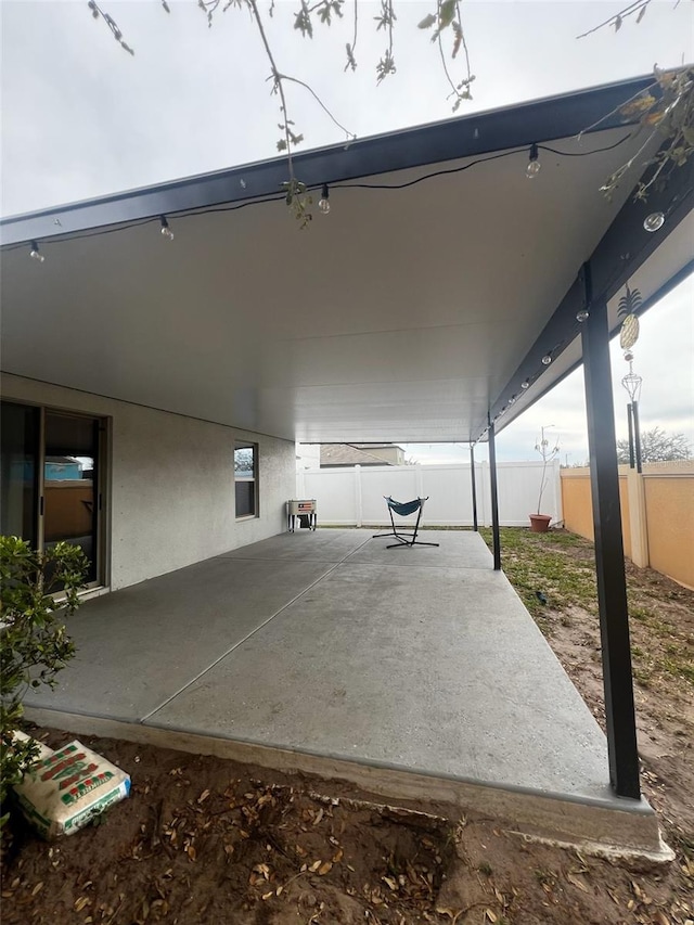 view of patio / terrace with fence