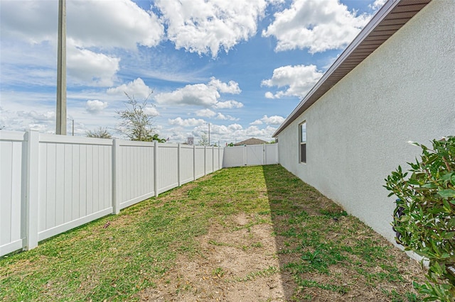 view of yard featuring a fenced backyard