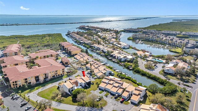 aerial view with a water view and a residential view