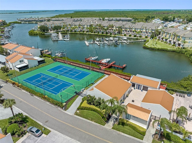 bird's eye view featuring a residential view and a water view