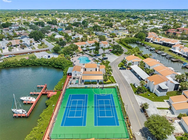 aerial view with a residential view and a water view