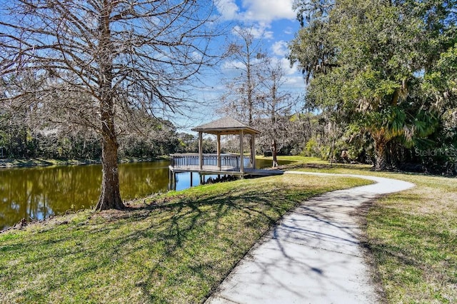 view of yard featuring a gazebo and a water view