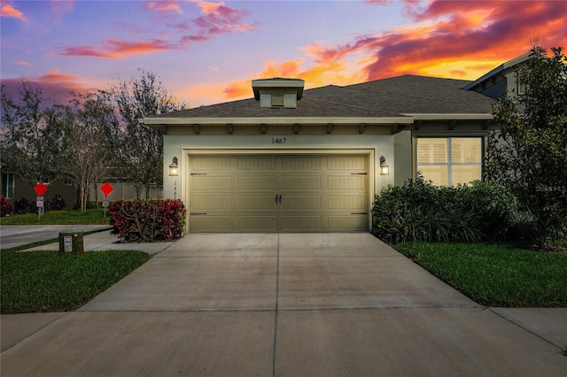 1467 Twin Villas Way, Dunedin, FL 34698 - view of front of home with concrete driveway, an attached garage, and stucco siding