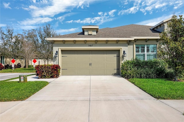 1467 Twin Villas Way, Dunedin, FL 34698 - view of front of house with stucco siding, concrete driveway, a garage, and a front yard