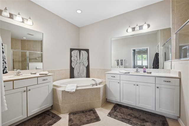 1467 Twin Villas Way, Dunedin, FL 34698 - full bathroom with a stall shower, a bath, two vanities, and tile patterned floors