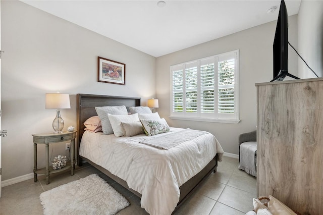 1467 Twin Villas Way, Dunedin, FL 34698 - tiled bedroom featuring baseboards