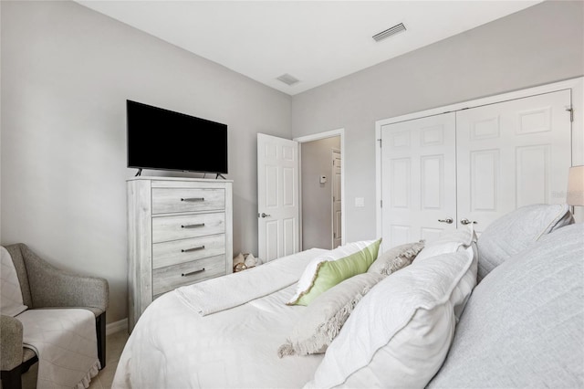 1467 Twin Villas Way, Dunedin, FL 34698 - bedroom featuring carpet flooring, a closet, and baseboards
