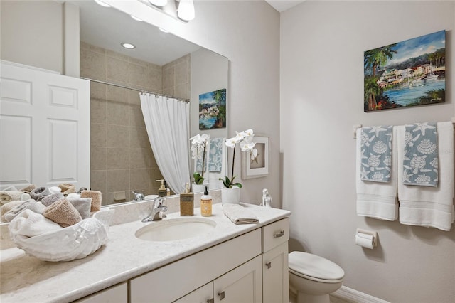 1467 Twin Villas Way, Dunedin, FL 34698 - full bathroom featuring toilet, tiled shower, vanity, and baseboards