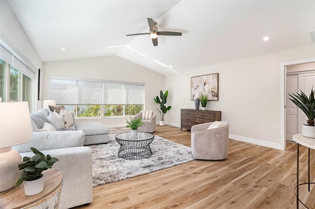 living room with ceiling fan, recessed lighting, wood finished floors, baseboards, and vaulted ceiling